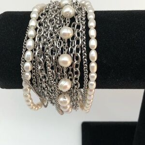 Multi chain Stainless Steel and real pearl bracelet.